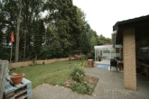 Gartenansicht - Wohnen und Arbeiten vereint: Haus mit Werkhalle, Garten und Waldzugang in Bad Salzuflen-Holzhausen
